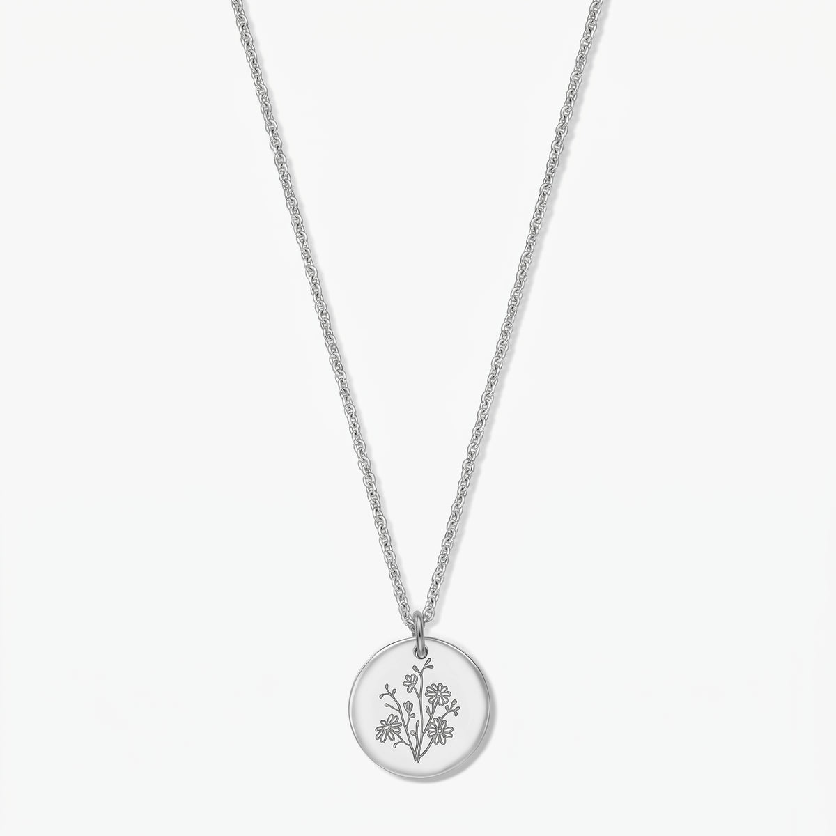 Silberkette mit Geburtsblume – runder Anhänger mit September-Aster-Gravur aus 925er Silber an einer zarten Kette, freigestellt vor weißem Hintergrund.