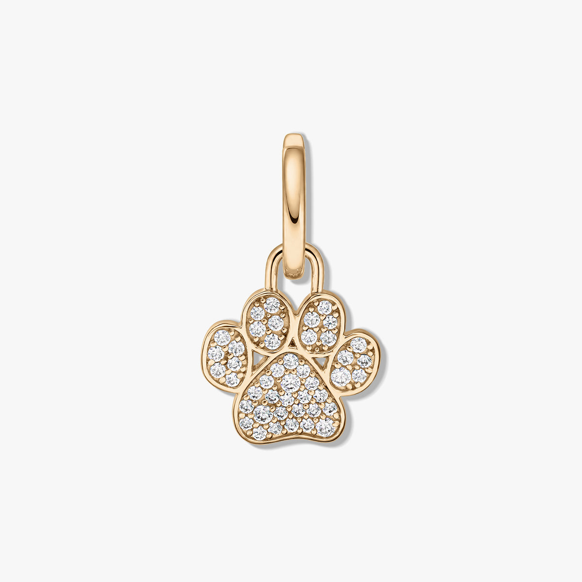 Anhänger in Pfotenabdruck-Design aus sterlingsilber mit gelber Goldplattierung und klarem Zirkonia-Pavé vor weißem Hintergrund.